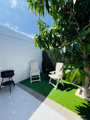 Jardín al aire libre en Bungalow Vista Dunas 32