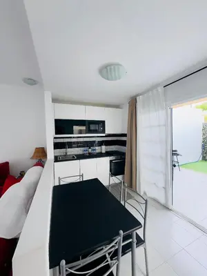 Una cocina o zona de cocina en Bungalow Vista Dunas 32