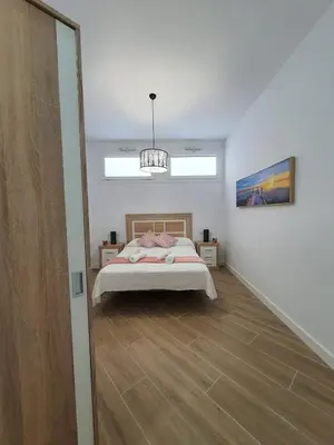 Cama o camas de una habitación en Alojamientos Agaete Pueblo Nº3