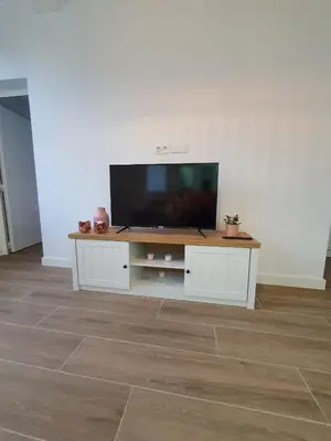 Una televisión o centro de entretenimiento en Alojamientos Agaete Pueblo Nº3