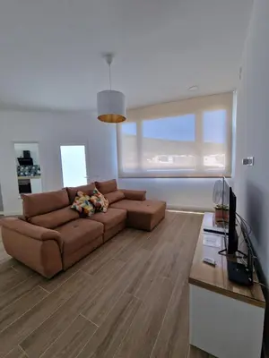 Una televisión o centro de entretenimiento en Alojamientos Agaete Pueblo Nº3
