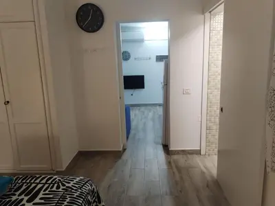 Una televisión o centro de entretenimiento en Vista Puerto Studio 1 Pers No balcon