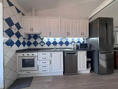Una cocina o zona de cocina en Bungalow in the heart of Arguineguín 2