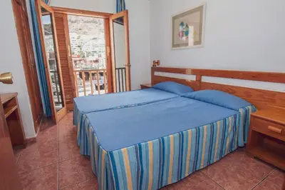 Cama o camas de una habitación en CityHub Vacation Home Montecarlo 40 Puerto Rico