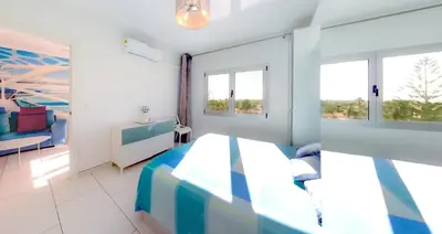 Cama o camas de una habitación en Sunandsea Apartment