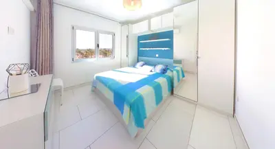Cama o camas de una habitación en Sunandsea Apartment