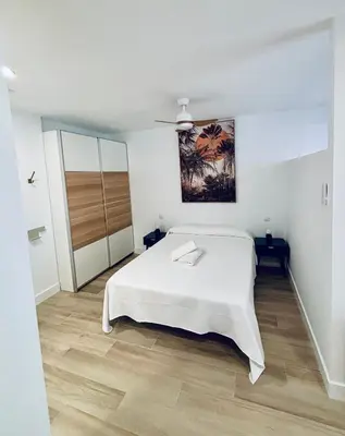 Cama o camas de una habitación en Playa de las Canteras- Albareda 1
