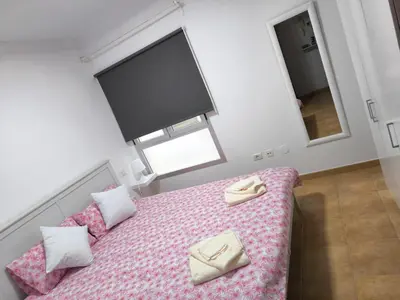 Cama o camas de una habitación en Atico Residencial Sardina Gáldar