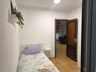 Cama o camas de una habitación en Atico Residencial Sardina Gáldar