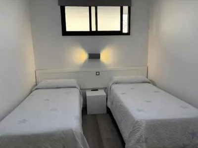 Cama o camas de una habitación en Riviera Paradise