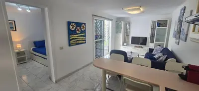 Una televisión o centro de entretenimiento en Casa Playa San Agustin