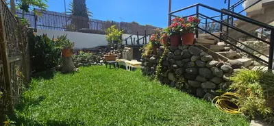 Jardín al aire libre en Casa Playa San Agustin