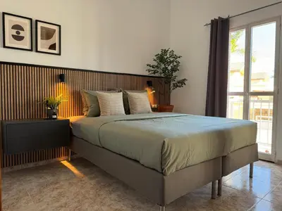 Cama o camas de una habitación en Green Oasis Paradise