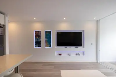 Una televisión o centro de entretenimiento en Bonito Apartamento en Maspalomas