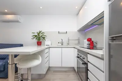 Una cocina o zona de cocina en Bonito Apartamento en Maspalomas