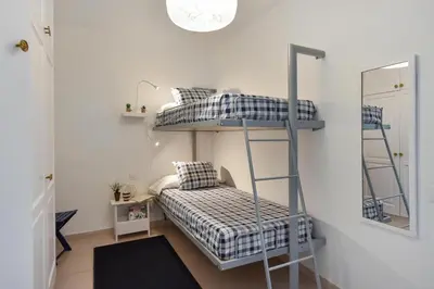 Cama o camas de una habitación en Spectacular 3-Bedroom Ocean View in Las Canteras