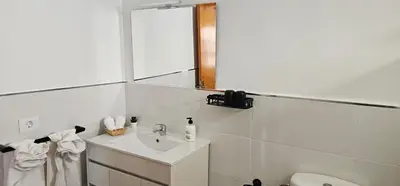 Un baño de Piso Amanecer CRUCE ARINAGA