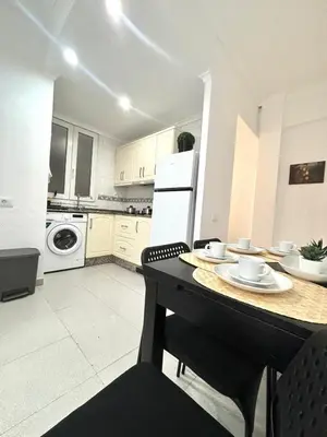 Una cocina o zona de cocina en Luis Morote 2-C Apartamentos
