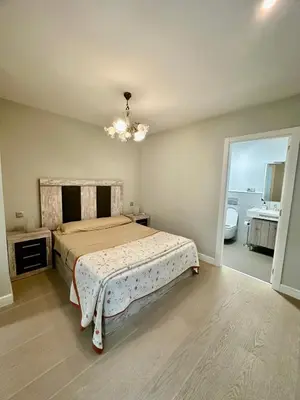 Cama o camas de una habitación en RaNee Apartments - 2 bed 2 bath in city centre
