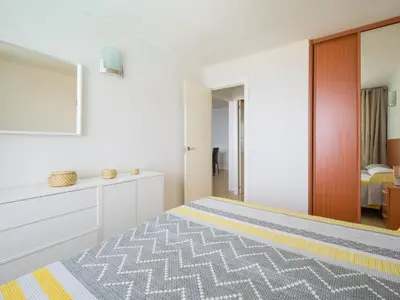 Cama o camas de una habitación en Amanecer Playa Patalavaca