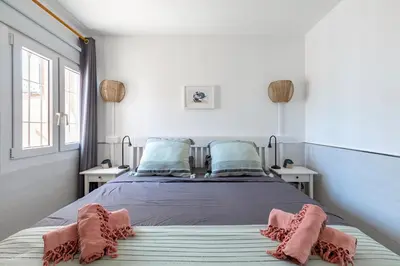 Cama o camas de una habitación en Flor del Arcoíris
