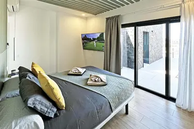 Cama o camas de una habitación en Salobre Las Yucas 5