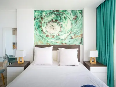 Cama o camas de una habitación en Beyond Amadores 11