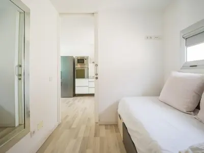 Cama o camas de una habitación en Beyond Amadores 11