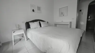 Cama o camas de una habitación en Casa MOLINA con TERRAZA al lado de la playa