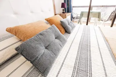 Cama o camas de una habitación en Frente al mar Playa de Melenara