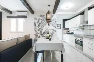 Una cocina o zona de cocina en ALBATROS 1L Tres habitaciones