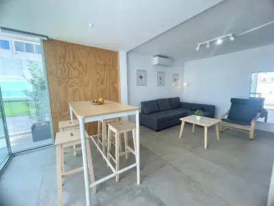 Zona de estar de Hachi Place Bungalow