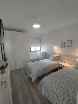 Cama o camas de una habitación en Flamboyán Vista Mar
