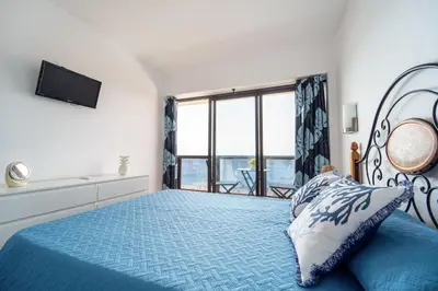 Cama o camas de una habitación en El Reino Azul de Gran Canaria