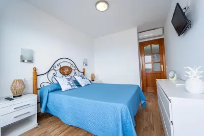 Cama o camas de una habitación en El Reino Azul de Gran Canaria
