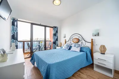 Cama o camas de una habitación en El Reino Azul de Gran Canaria