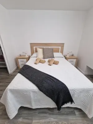 Cama o camas de una habitación en Alojamientos Agaete Pueblo Nº14