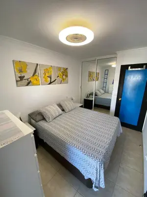Cama o camas de una habitación en Sweet Home on the Beach 212