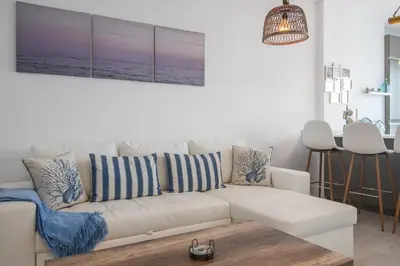Zona de estar de Home2Book Beachy Vibes Sea Side Apartment, Guía