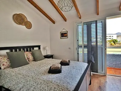 Cama o camas de una habitación en Dúplex Hoya del Viejo