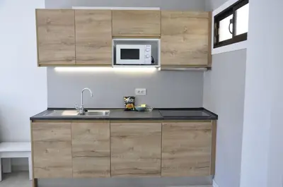 Una cocina o zona de cocina en 711 Cumana2 Puerto Rico by Alquiler de Sùeño