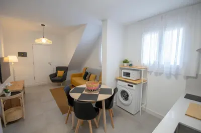 Una cocina o zona de cocina en Apartamentos Marmolejos