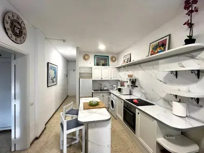Una cocina o zona de cocina en Sunny Garden&Playa Apartment - Playa Del Inglés