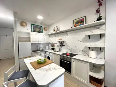 Una cocina o zona de cocina en Sunny Garden&Playa Apartment - Playa Del Inglés