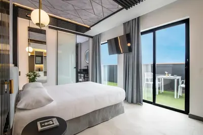 Cama o camas de una habitación en Hotel Puerto de la Luz by Pierre & Vacances