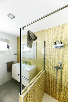 Un baño de Villa ArenaMar with private Pool