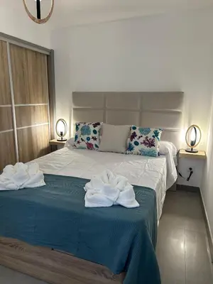 Cama o camas de una habitación en NORAY Playa de Mogán