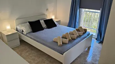 Cama o camas de una habitación en Bungalow Maspalomas
