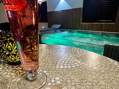 Piscina en o cerca de Villa Puerto Rico in front of the shopping center with private heated saltwater pool with jacuzzi function & arcade games OR St andard Villa Puerto Rico in front of the shopping center with private heated saltwater large jacuzzi No Pool& arcade games