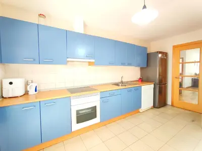 Una cocina o zona de cocina en Sunshine Apartment